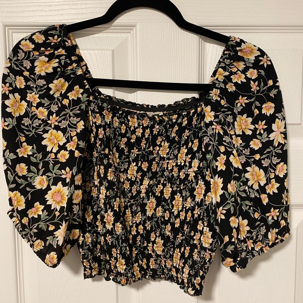 Two crop top 3/4 length sleeved shirts